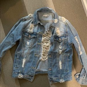 light wash jean jacket with rips